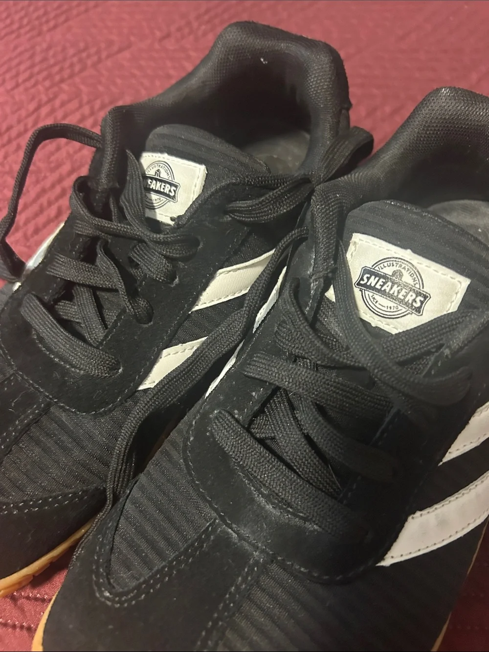 Black barefoot-style sneakers